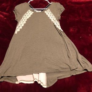 Super cute top with tie on the back